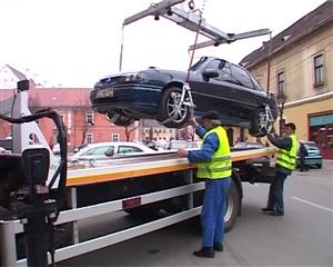 Ridicarea maşinilor în Cluj se face în continuare în mod ilegal VIDEO
