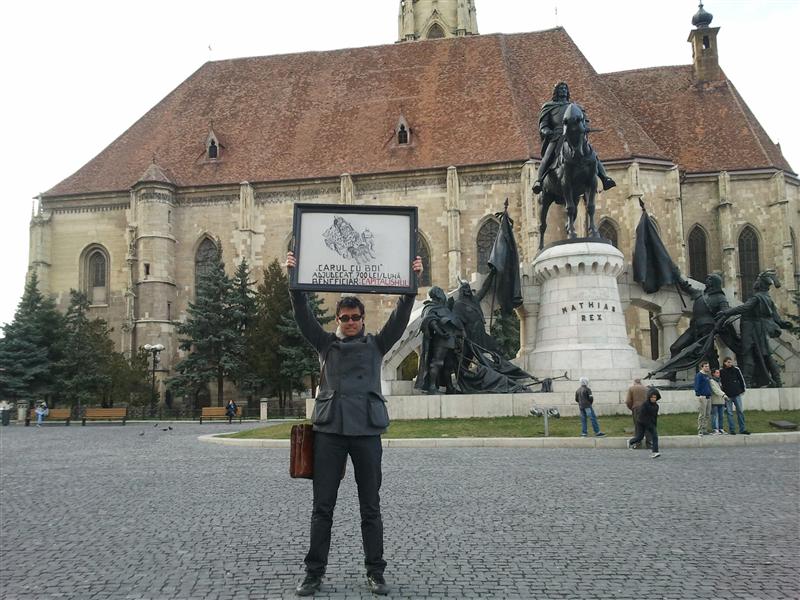 Protest împotriva ACTA la Cluj: o mască, o pancartă, un tablou şi 15 oameni FOTO / VIDEO