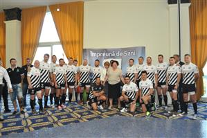 Echipa de rugby a lui 