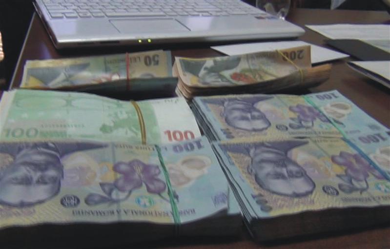 Ce au găsit poliţiştii în urma percheziţiilor în dosarul de evaziune şi spălare de bani de peste un milion de euro