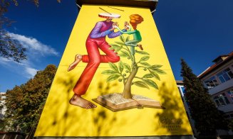 Artiştii stradali clujeni dau o nouă înfăţişare Şcolii "Octavian Goga" din Cluj. Cum arată clădirea, acoperită cu grafitti