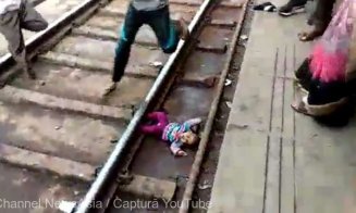 Un copil a scăpat miraculos după ce a căzut pe şine, iar un tren a trecut peste el