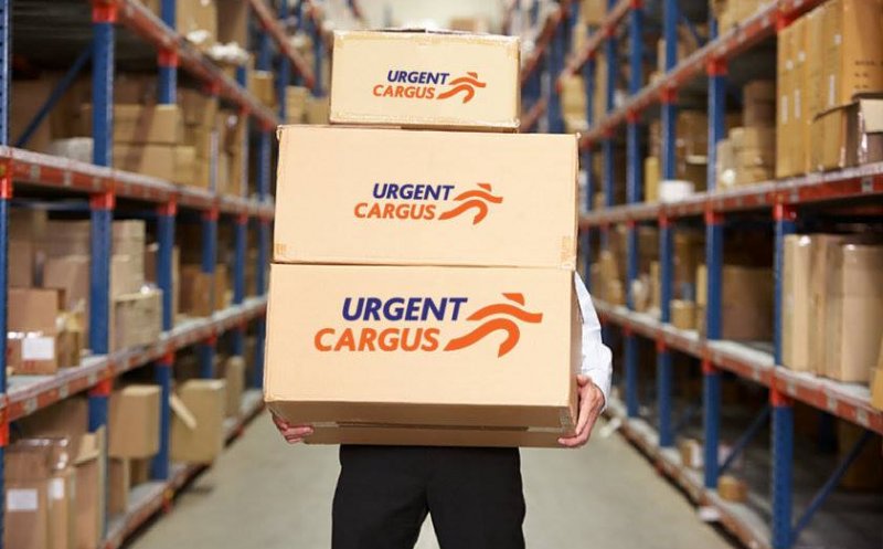Curierii de la Urgent Cargus, cumpărați de Mid Europa