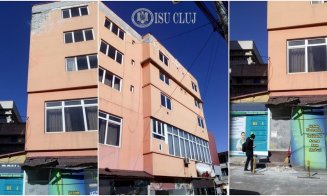 Cade tencuiala de pe fostul hotel din Piața Mihai Viteazul. Intervin pompierii, parcările blocate