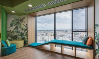 Angajații de la NTT DATA intră în bucătărie de pe tobogan. Cum arată noul sediu