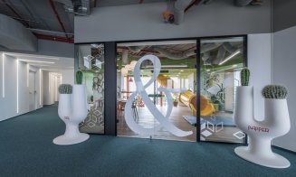 Angajații de la NTT DATA intră în bucătărie de pe tobogan. Cum arată noul sediu