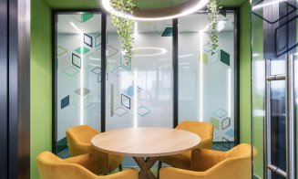 Angajații de la NTT DATA intră în bucătărie de pe tobogan. Cum arată noul sediu