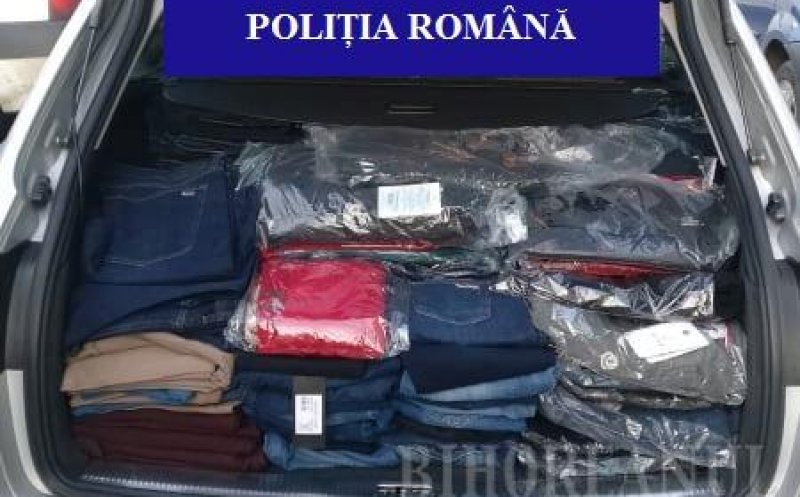 Clujeni, prinși la vândut de haine fake de mii de euro în Oradea