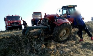 Accident grav la Cluj. Un tânăr a fost prins sub un tractor