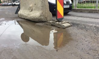 Podul de pe Porțelanului, spaima șoferilor. Vechile gropi au ajuns piscine