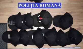 Percheziții la sediul unor magazine din Cluj-Napoca. Polițiștii au găsit haine și încălțăminte contrafăcute