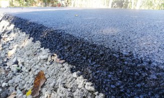 A început asfaltarea drumului județean care leagă Clujul de Bistrița-Năsăud