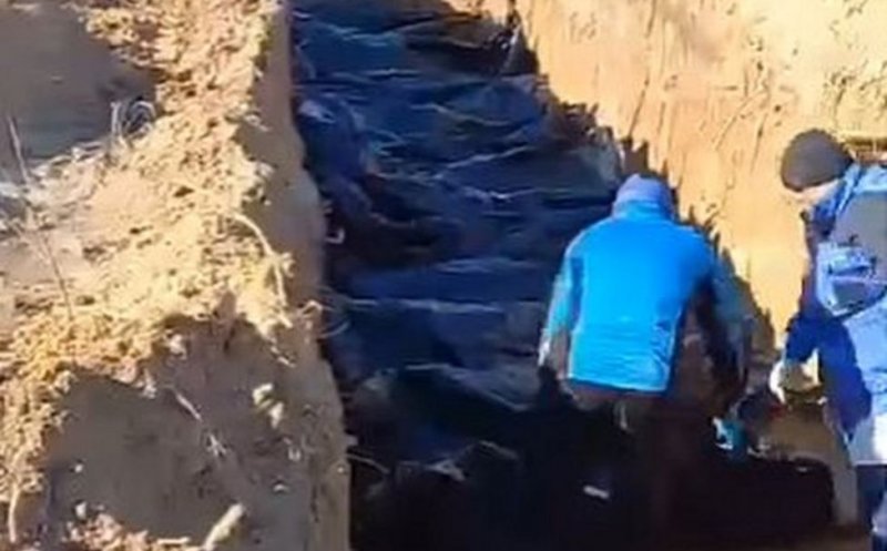 Gropi comune în Ucraina. Nu toți morţii au fost identificați. Nimeni nu știe exact unde sunt rudele lor
