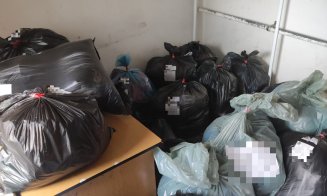 Trei tineri, reținuți de polițiști. Au furat haine de 100.000 de lei din depozitul unui mall din Cluj