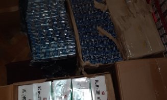 Contrabandă cu sute de mii de țigări în Cluj. Trei bărbați, arestați preventiv