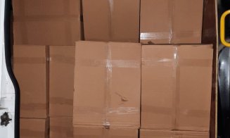 Contrabandă cu sute de mii de țigări în Cluj. Trei bărbați, arestați preventiv