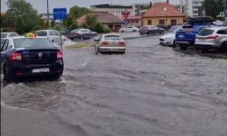 Potop la Cluj-Napoca. Ploaia torențială a inundat mai multe astăzi