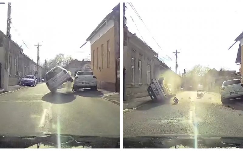 Accident în Turda! Momentul în care o mașină s-a IZBIT puternic de un autoturism parcat și s-a RĂSTURNAT