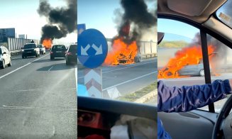 Maşină mistuită de flăcări pe centura Clujului / Şoferii trec pasivi mai departe...