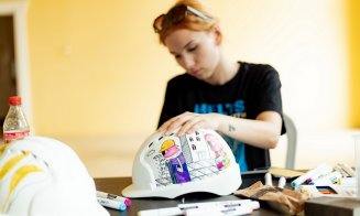 125 de căști de protecție pe șantier au fost desenate de studenți, în cadrul unui parteneriat între grupul IULIUS și UAD Cluj-Napoca