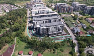 "Poarta de intrare" în noul cartier al Clujului e gata. Cum e să locuiești în clădirea care are propriul spital și spații de birouri