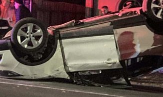 ACCIDENT sau CASCADORIE în Cluj: Mașină răsturnată, şofer băut