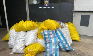 Un hoț a fost reținut de polițiștii clujeni după ce a furat saci cu haine de 20.000 de euro