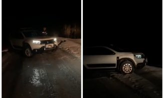 Turiști salvați de jandarmii clujeni după ce au rămas blocați cu mașina pe un drum înghețat