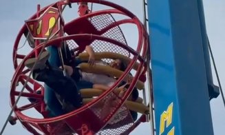 Doi copii au căzut brusc spre sol de la 90 m înălțime cu tot cu capsula de fier în care se aflau / Cablurile instalației din parcul de distracții au cedat