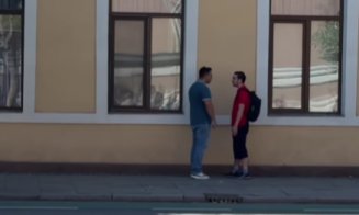 Altercație filmată în Cluj-Napoca, zona The Office: un șofer s-a dat jos din mașină și s-a luat de un pieton