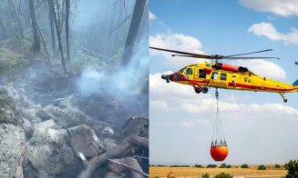 Incendiu neobișnuit într-o pădure din Cluj: focul se manifestă în subteran după ce un fulger a aprins câțiva copaci. Pompierii au chemat elicopterul